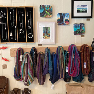 Paintings, jewelry and knitted scarves at the Makers' Market Shop and Studio, next to El El Frijoles in Sargentville, Maine